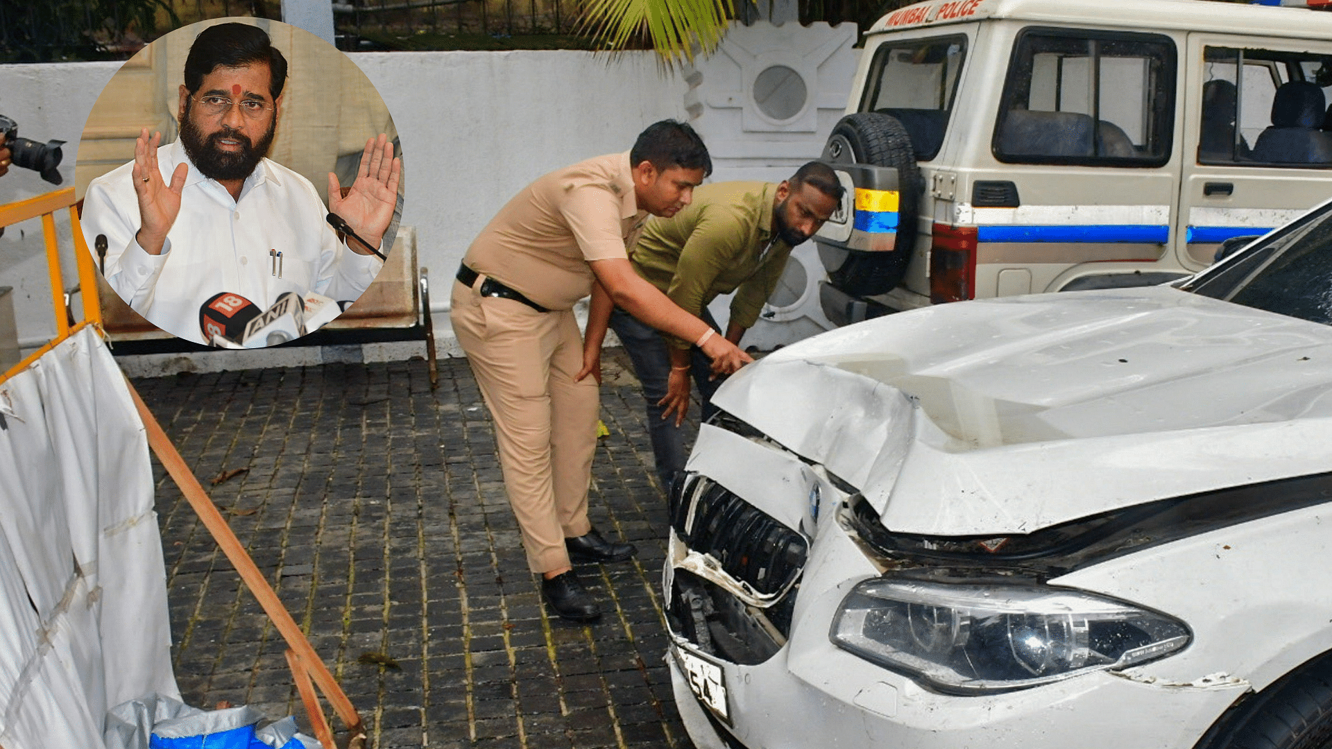 <div class="paragraphs"><p>A damaged BMW car that was involved in an accident, parked on the premises of Worli police station, in Mumbai, Sunday, July 7, 2024. Added a mugshot of CM Eknath Shinde.</p></div>